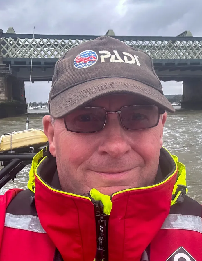 Andrew Grundy in PADI cap and drysuit