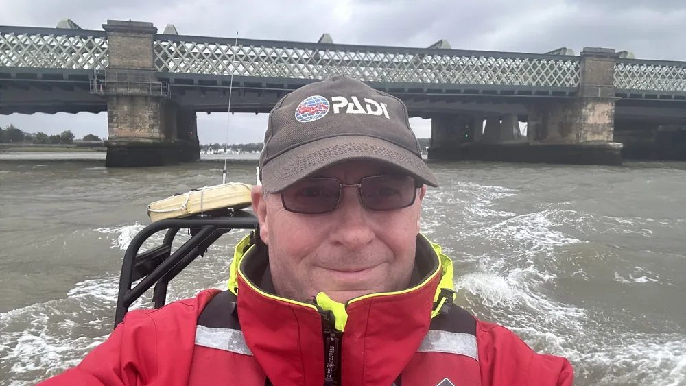 Andrew Grundy on a safety boat in UK waters