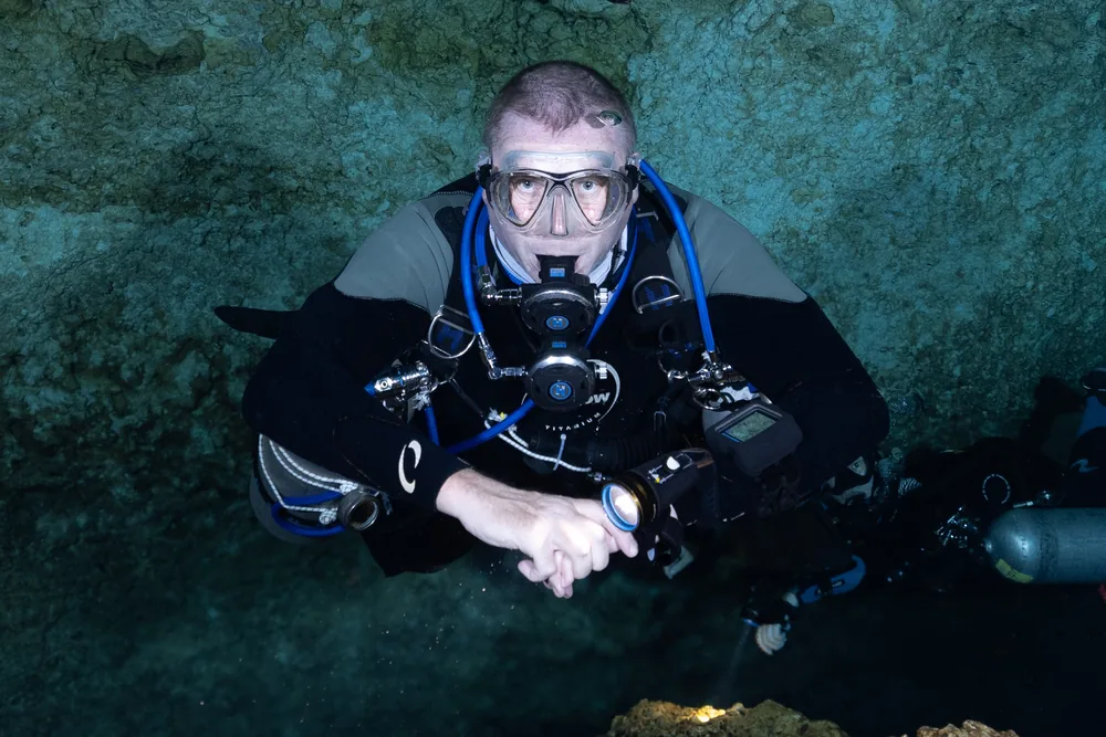 Andrew Grundy underwater in scuba equipment